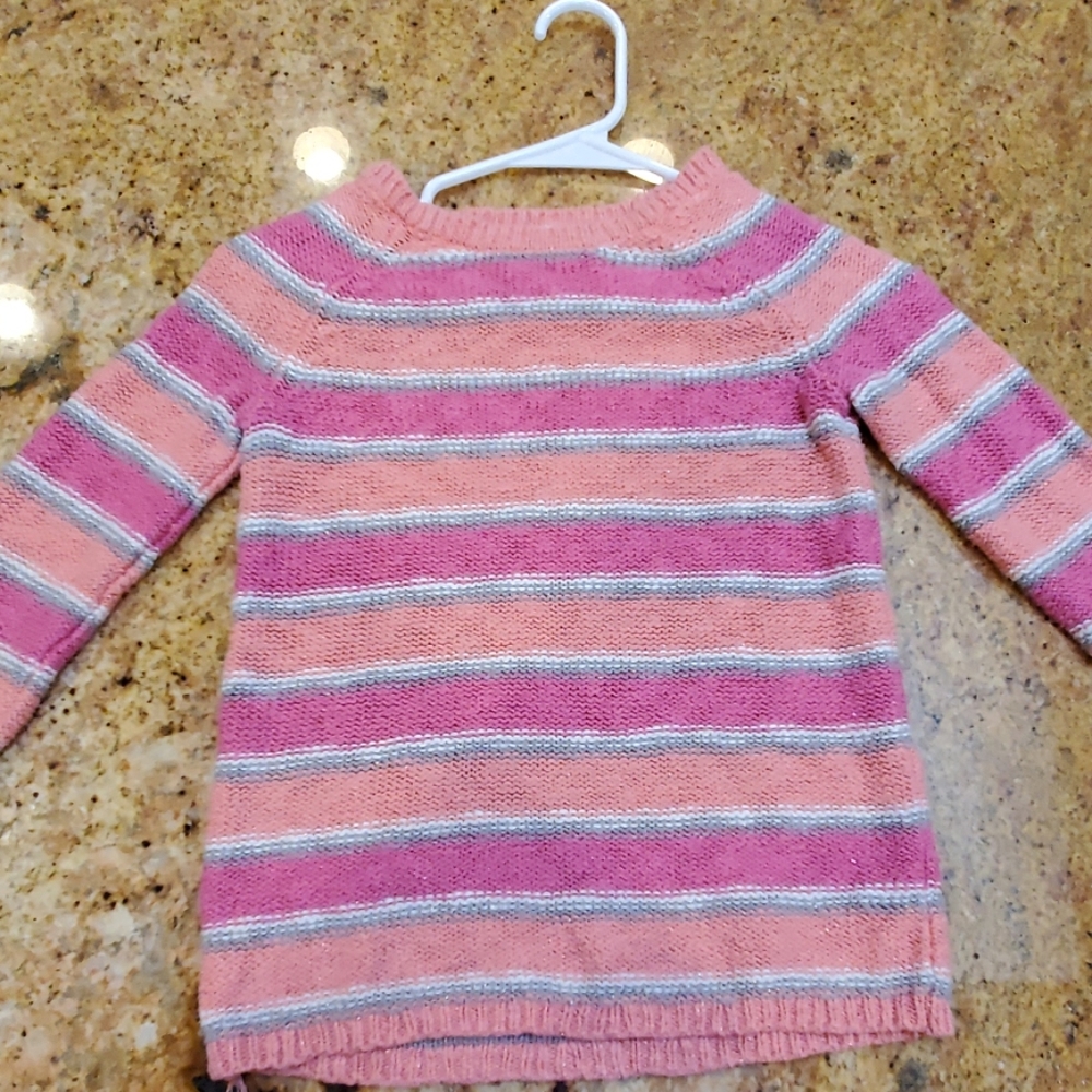 Sparkly knitted sweater for girls.